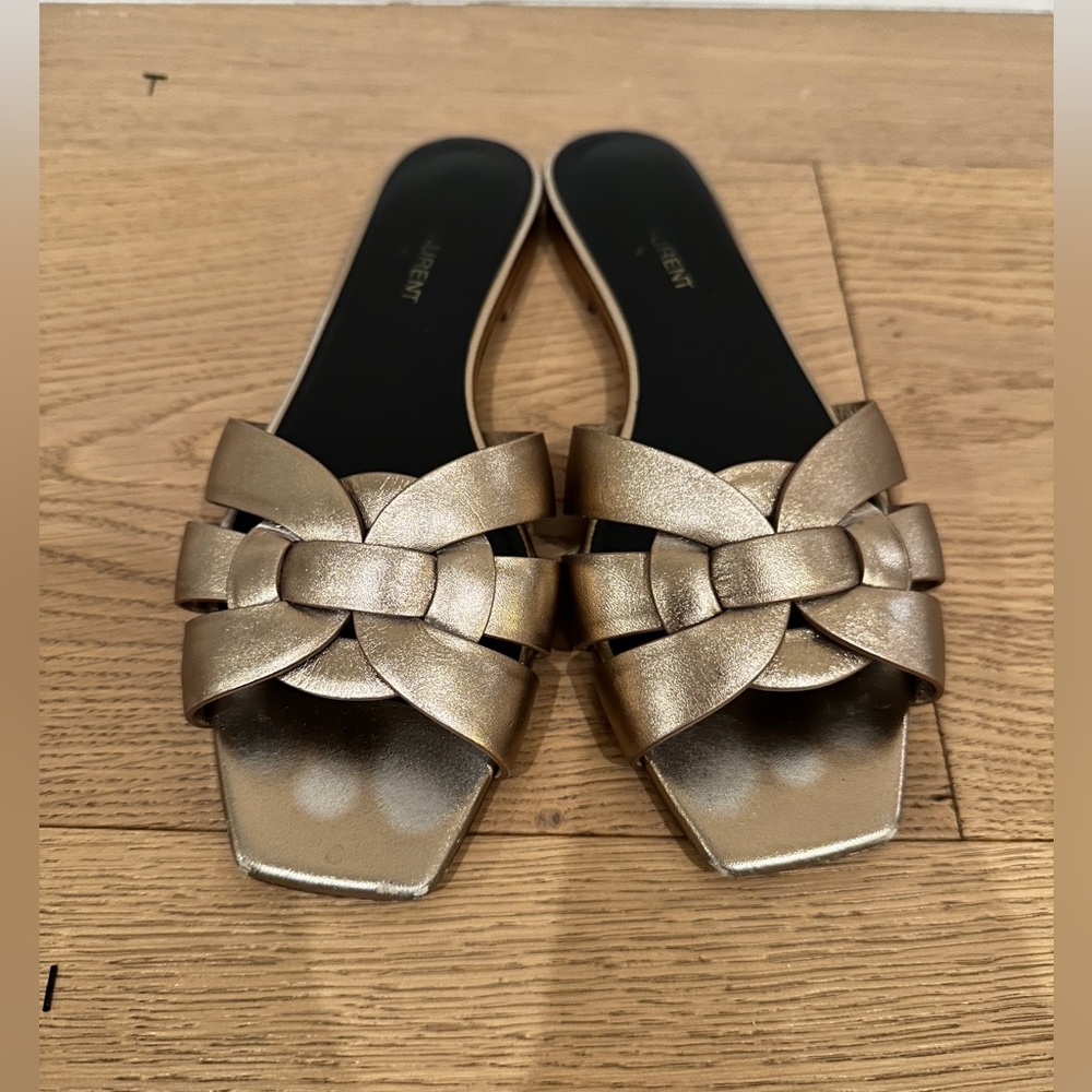 Saint Laurent Tribute Leather Slides. Didn’t fit me. They are 71/2 but fit 61/2